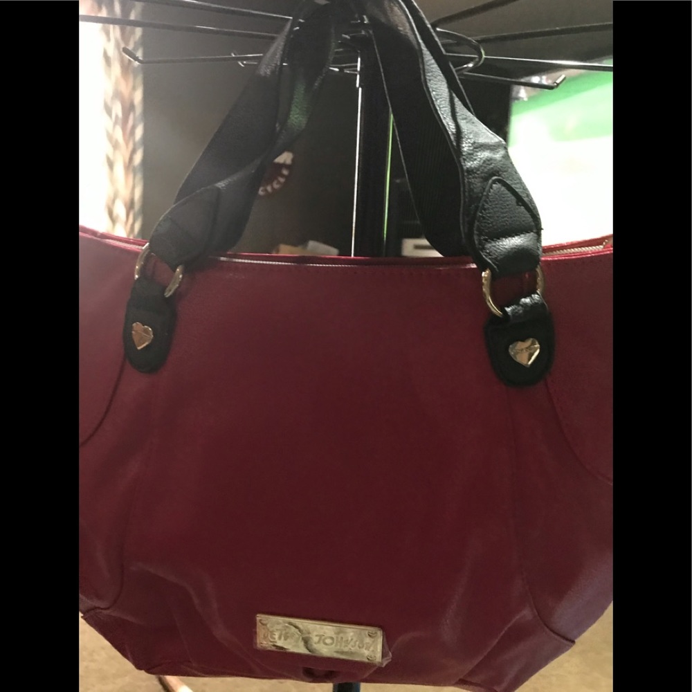 Woman’s purse by Betsy Johnson pink and black